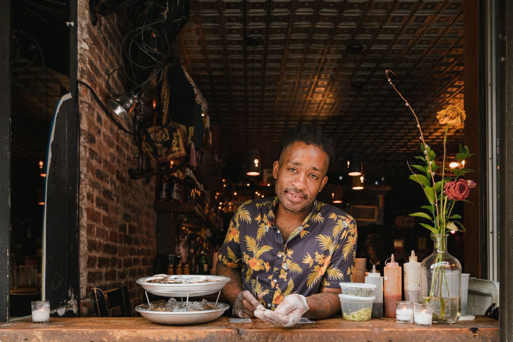 A restaurant owner checking messages at the counter